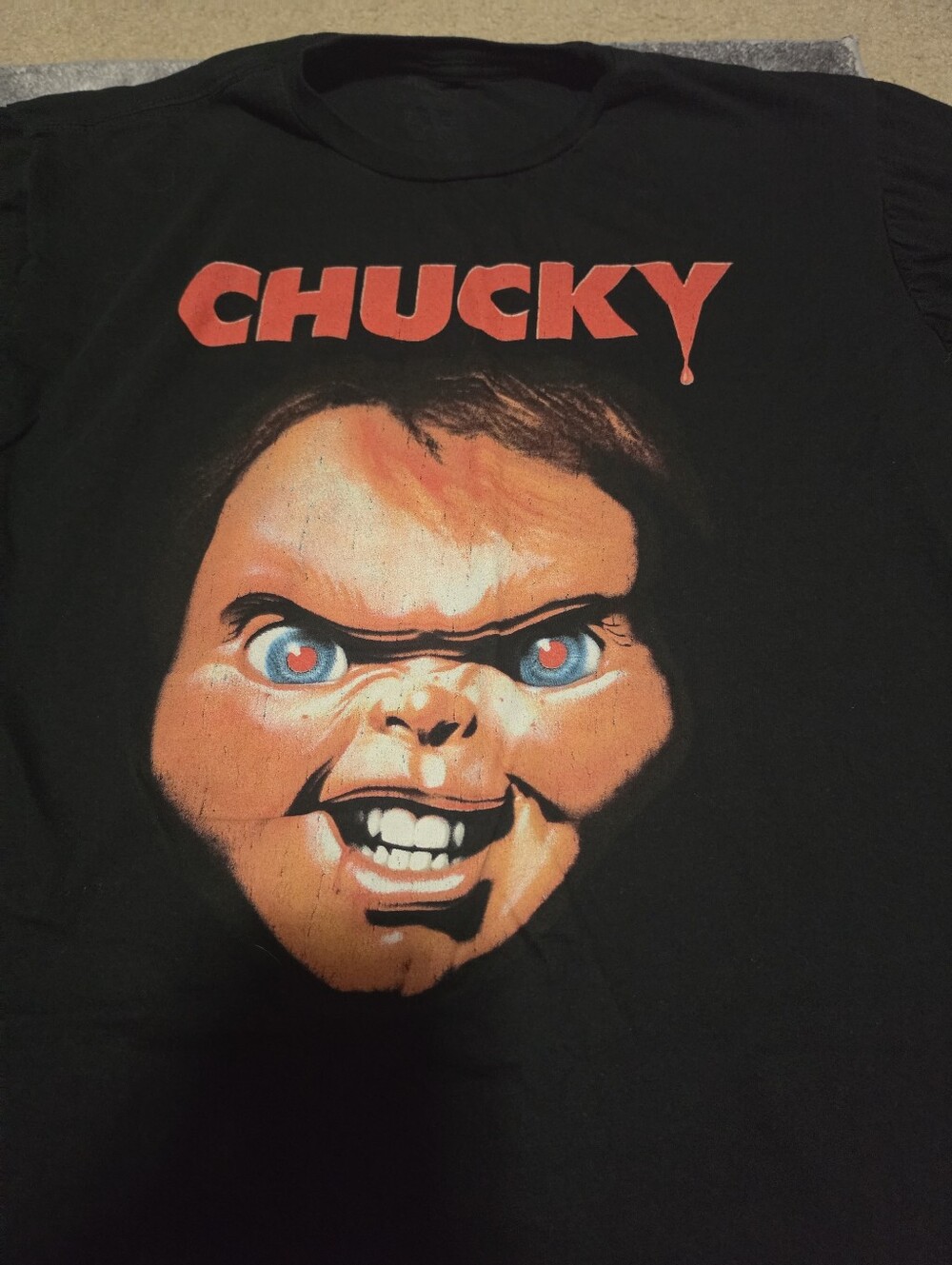 Chucky Graphic Tee with Red Logo and Orange Face Preloved Minor Flaws